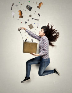 Woman is running with a box in her hands, and some things are coming out of it.