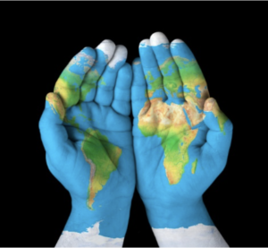 Asking for help in ministry Hands held out in front together with the image of the world map